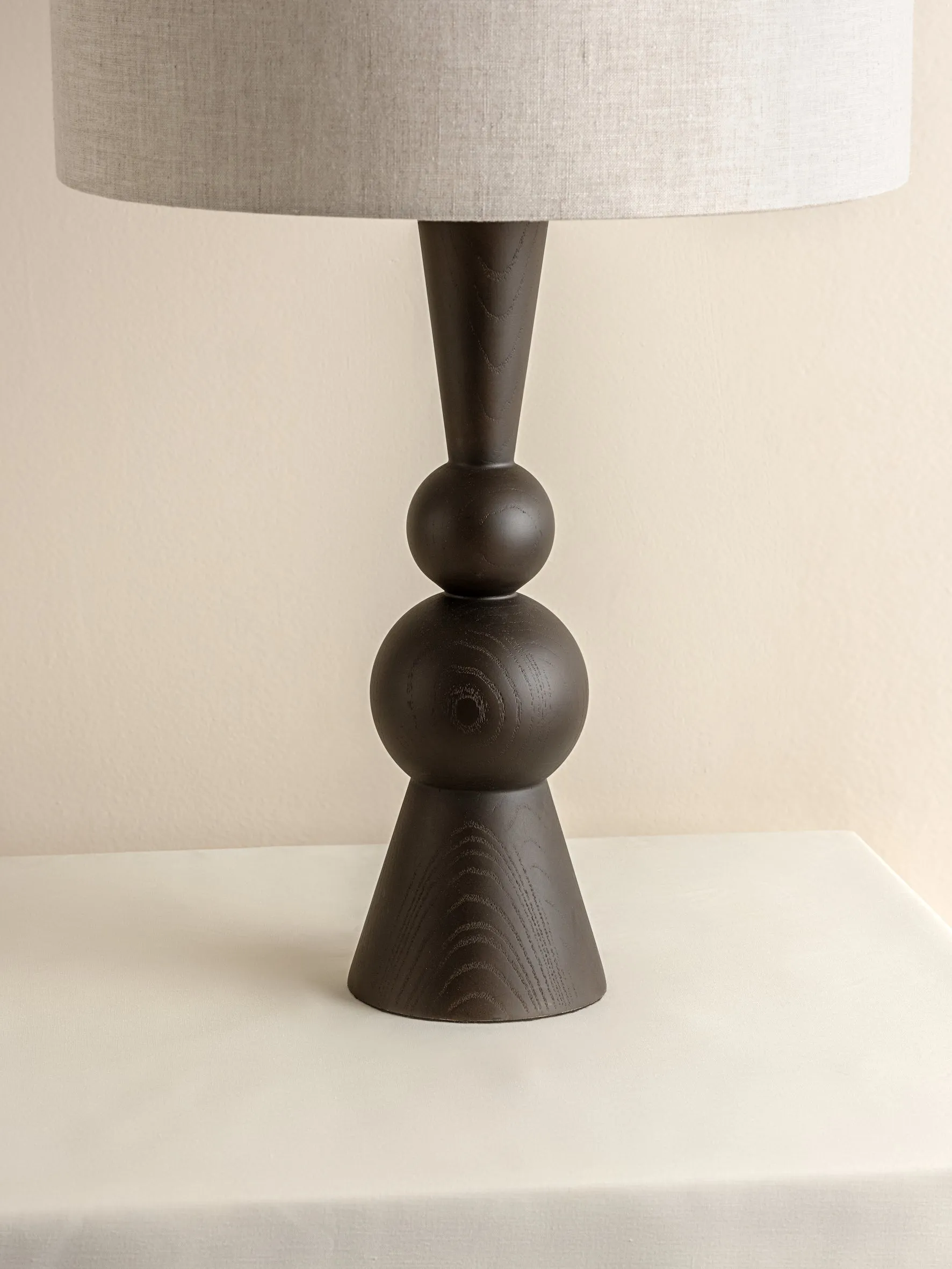 Carmine - dark wood and linen table lamp